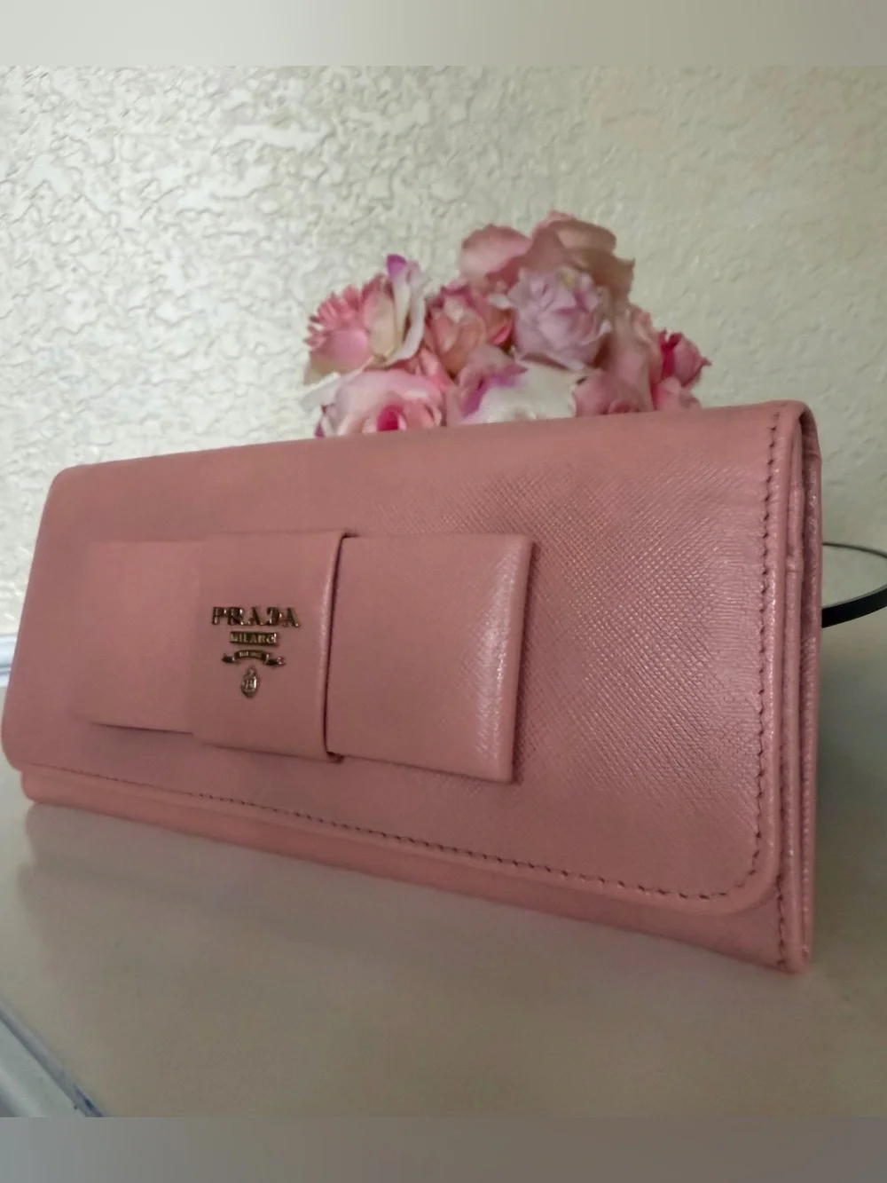 Pink Prada Saffiano leather long wallet flap closure with bow